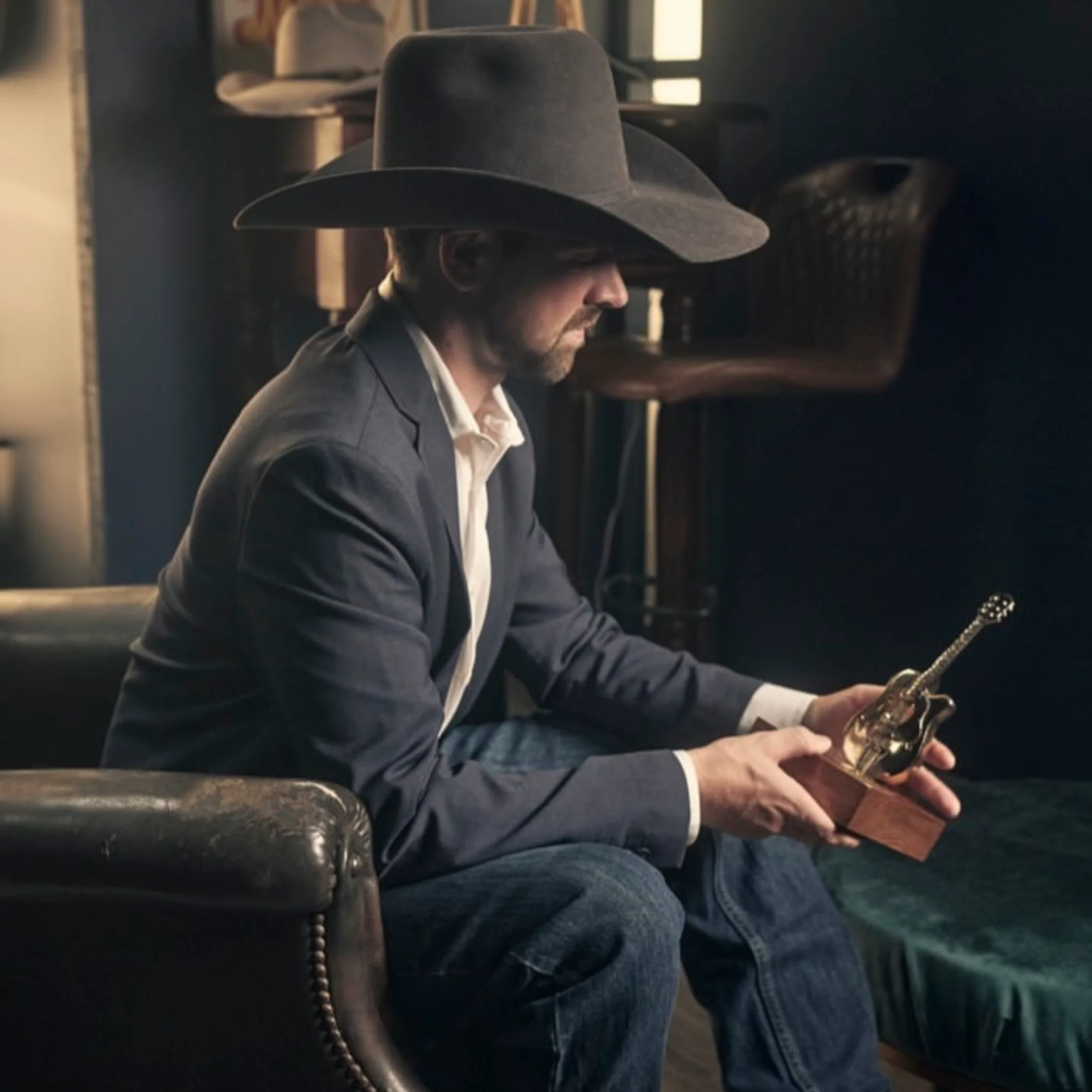 country musician with guitar props